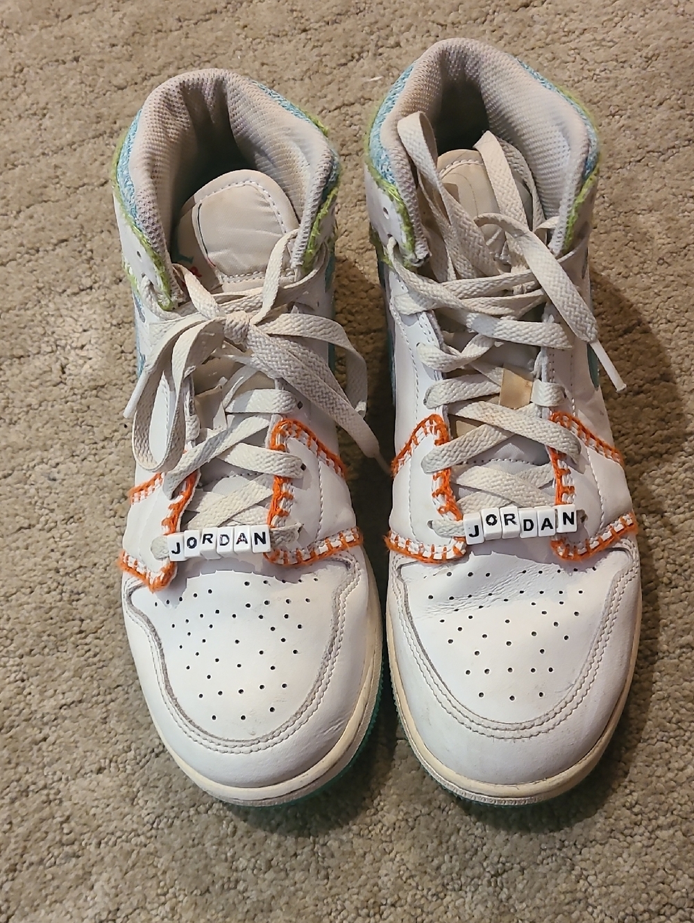 Jordan Kids White High-Top Sneakers with Orange Stitching